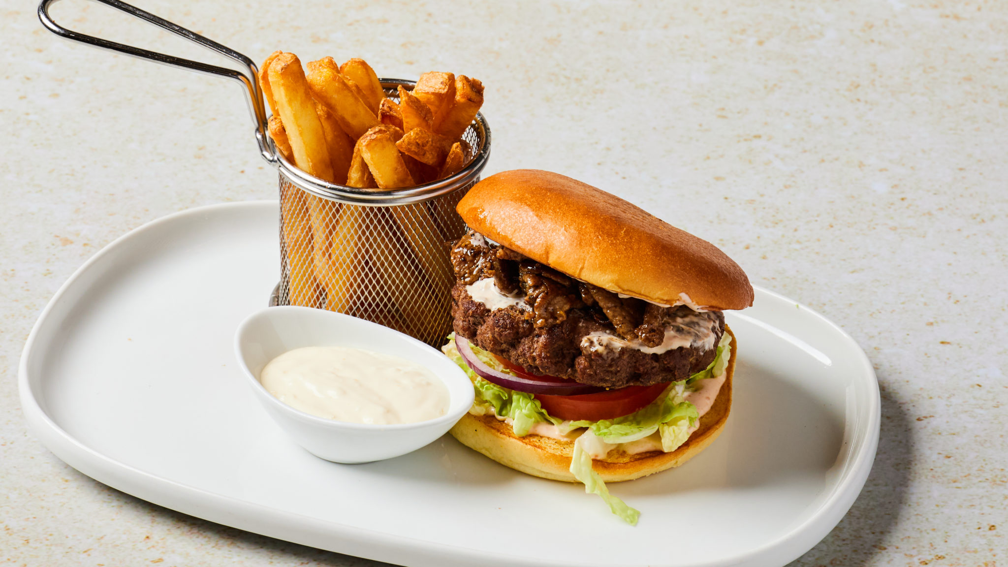 Homemade beef burger with fries